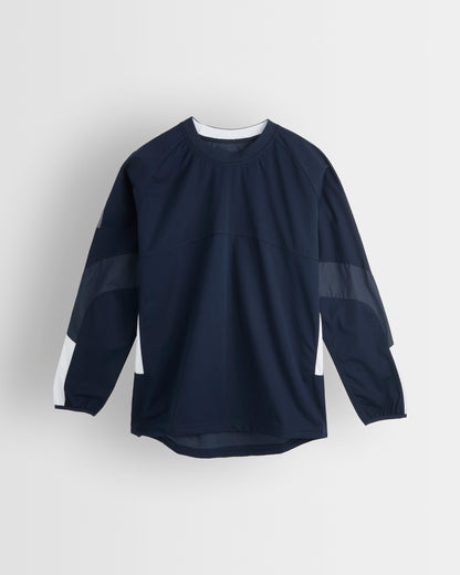 A navy blue long-sleeve athletic contact top with white side panel accents and semi-sheer dark grey sleeve inserts, displayed against a light grey background.