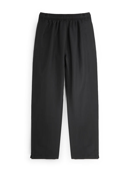 Black track pants on a white background