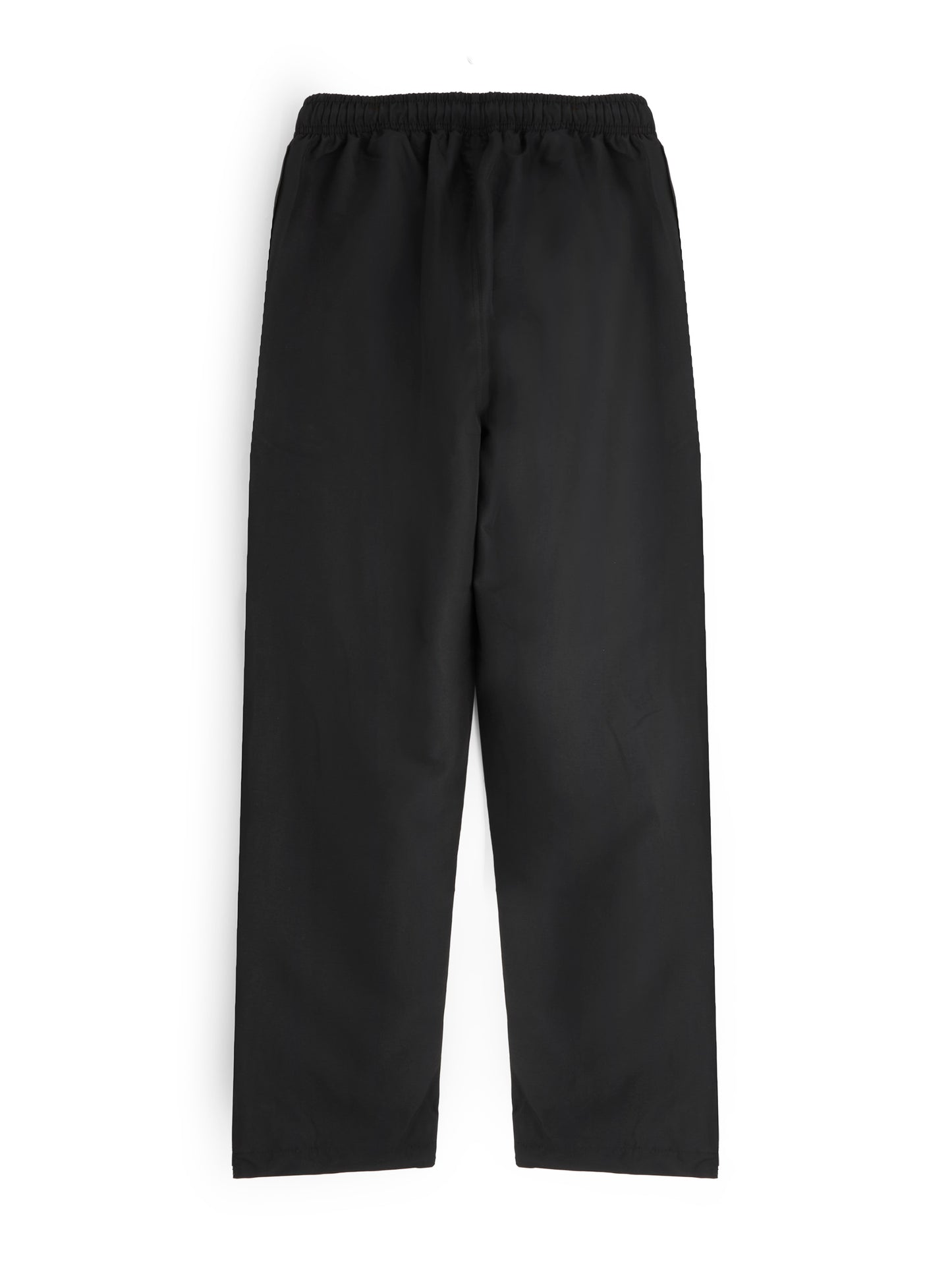 Black track pants on a white background
