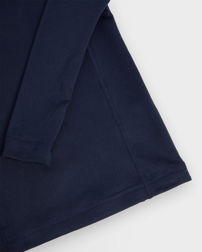 Close up of a navy-coloured long-sleeved baselayer top sleeve and hem