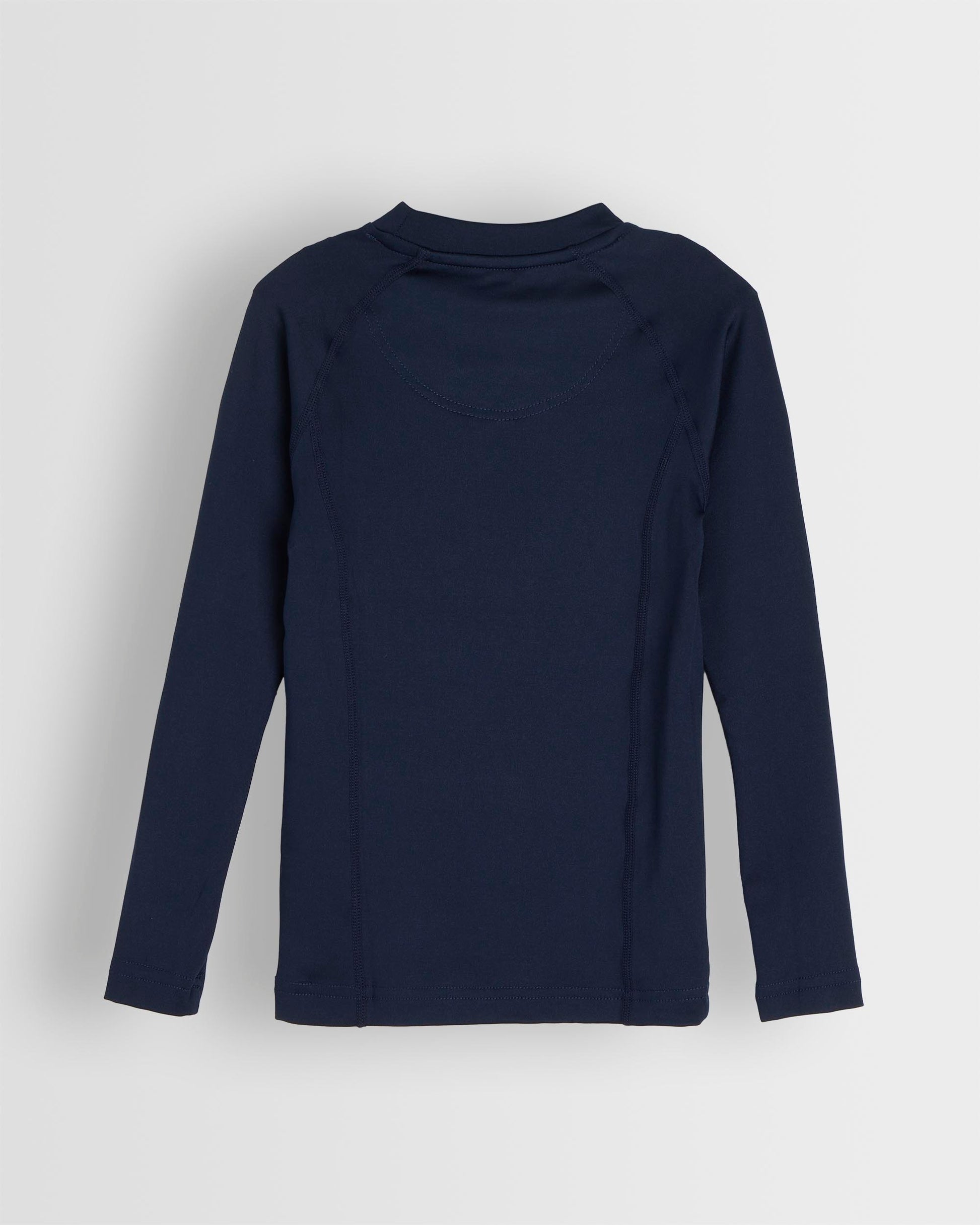 Back shot of navy-colored long-sleeved baselayer top laid flat on a plain background.