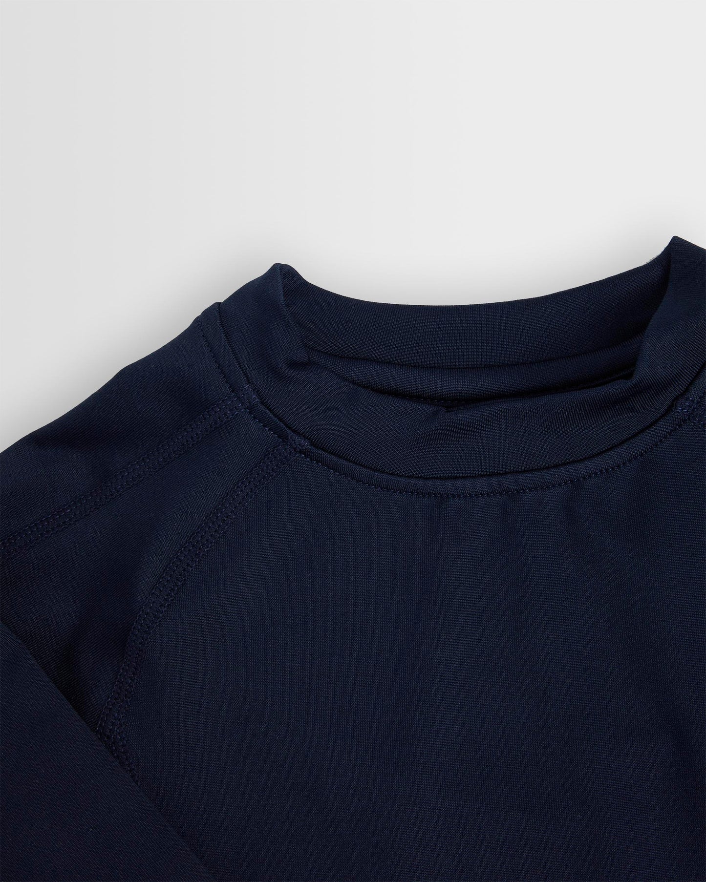 Close up of crew neck navy baselayer