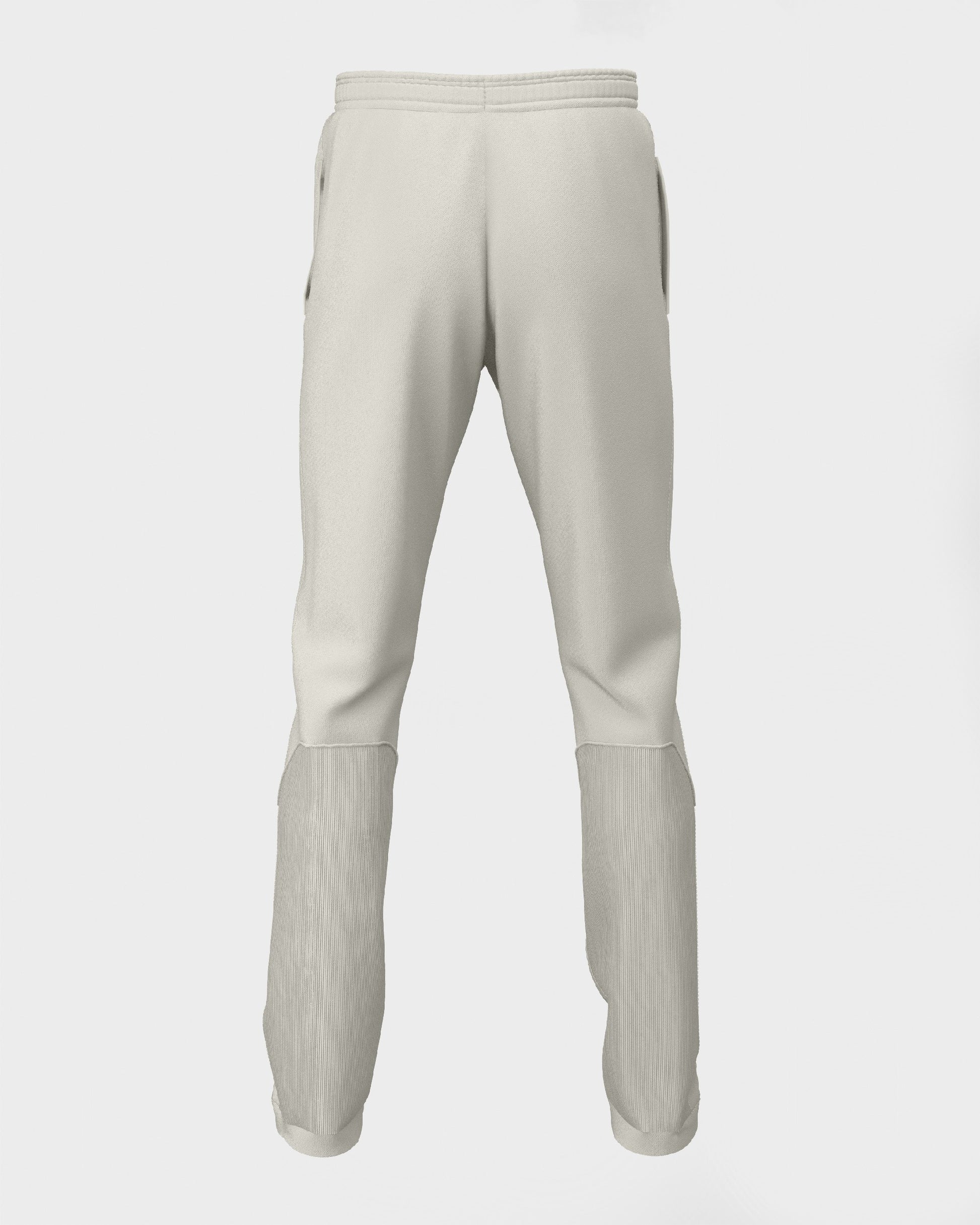Back view of pair of white cricket trousers for kids, displaying a straight-leg design with a drawstring waistband.