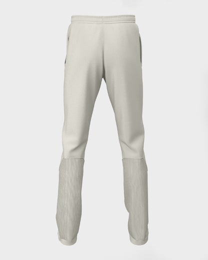 Back view of pair of white cricket trousers for kids, displaying a straight-leg design with a drawstring waistband.