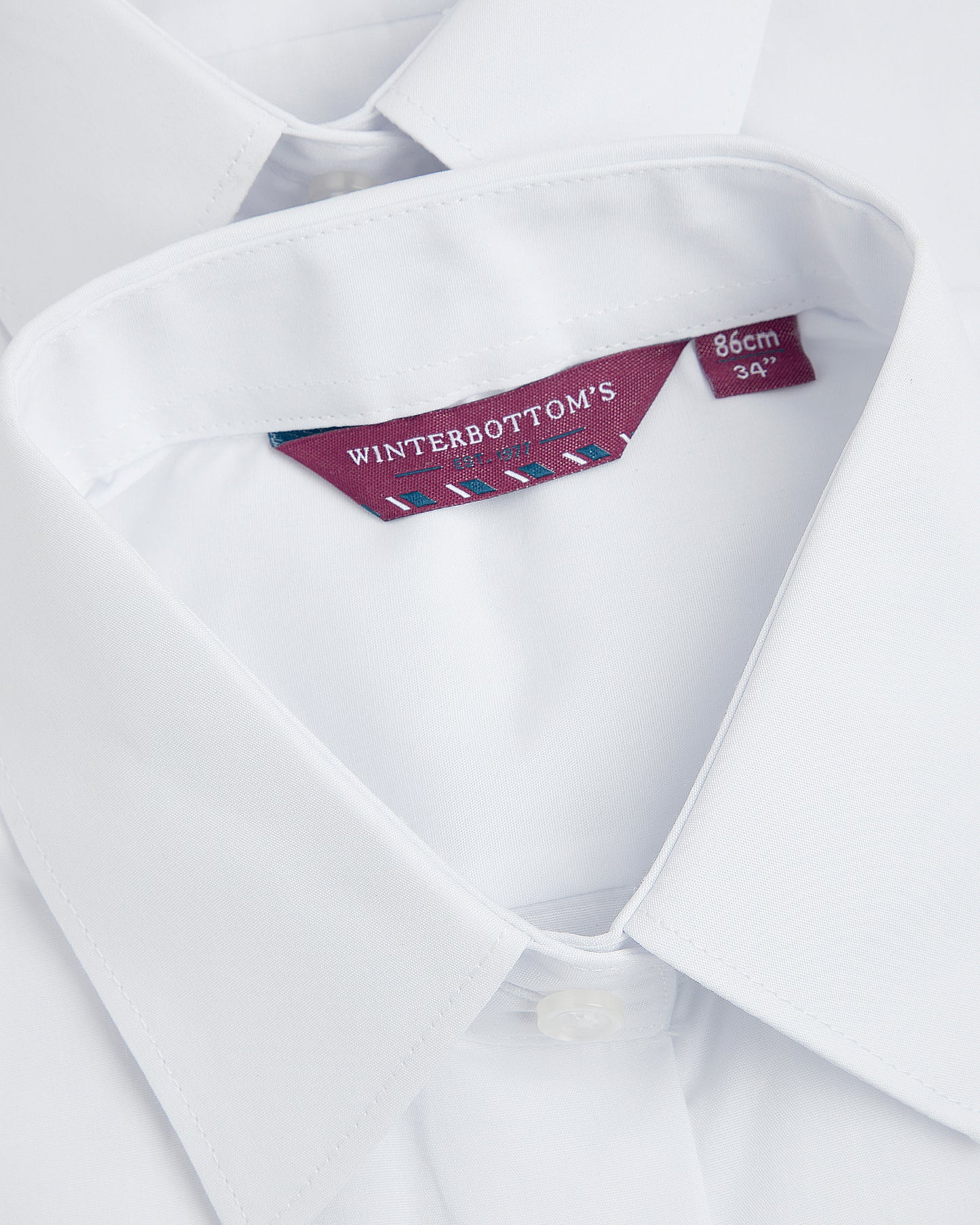 collar shot showing brand and size tags