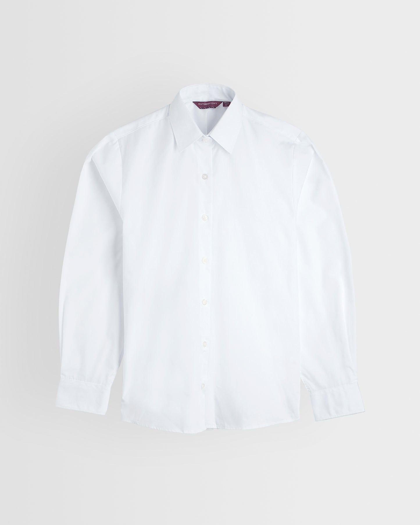Front of single white blouse on grey background