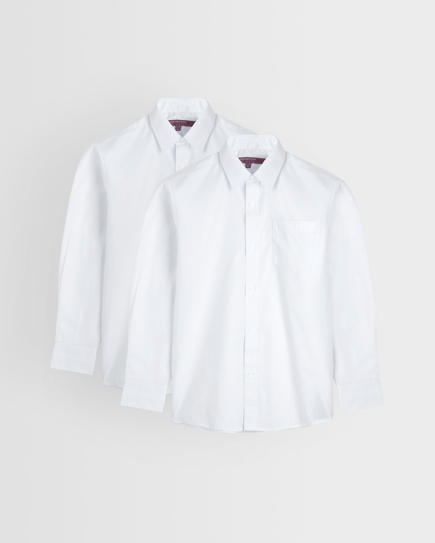 Two white long sleeve shirts laid out flat on a white background, one with the collar visible and the other showing the chest area.