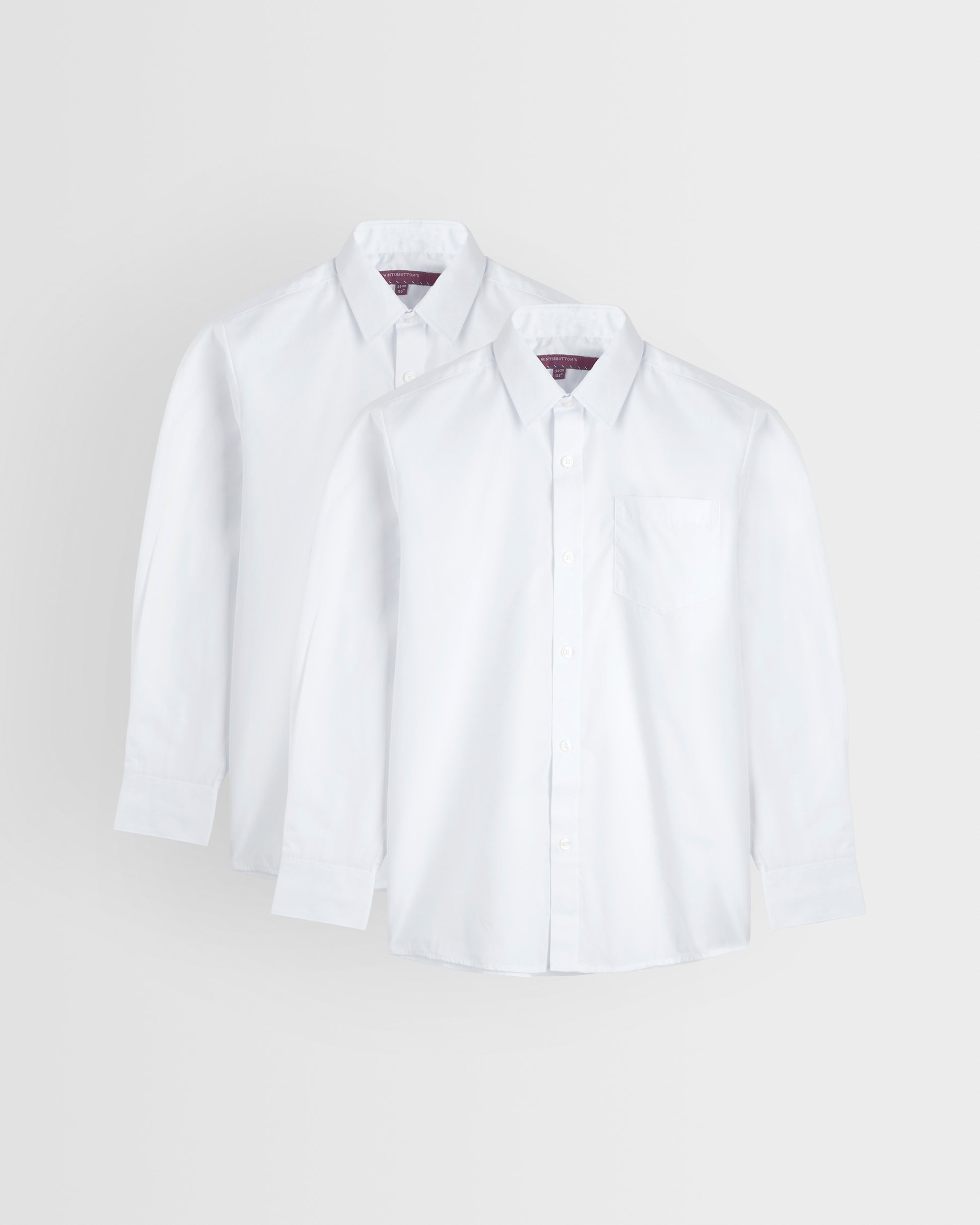 Two white long sleeve shirts laid out flat on a white background, one with the collar visible and the other showing the chest area.