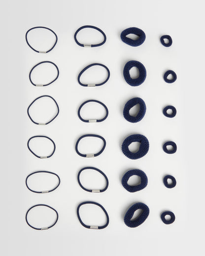navy hair ties full amount (24) on a light grey background