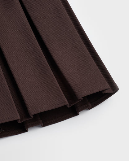 A closeup of the box pleat displayed against a plain background.