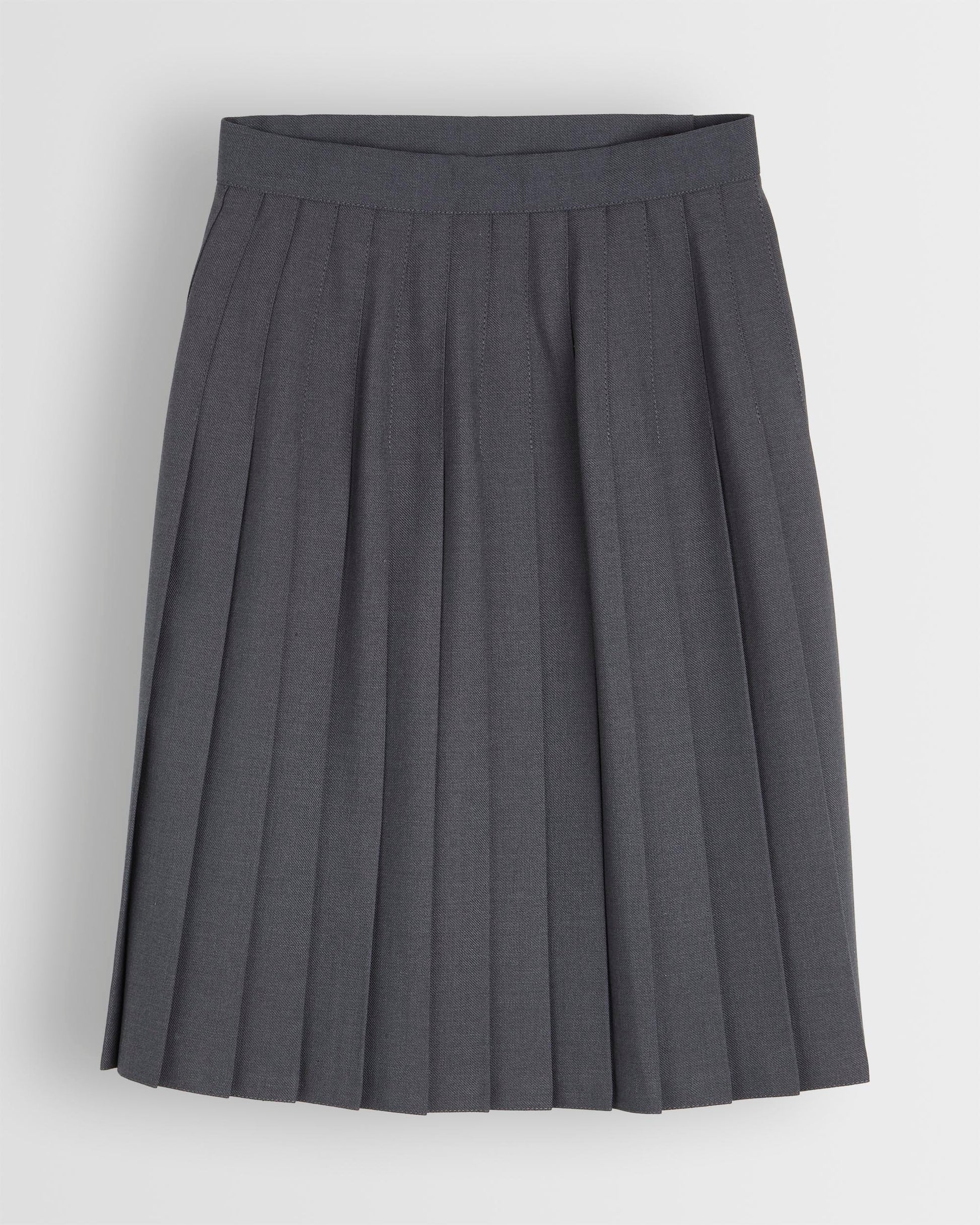 Back shot of girl gry kilt with pleating