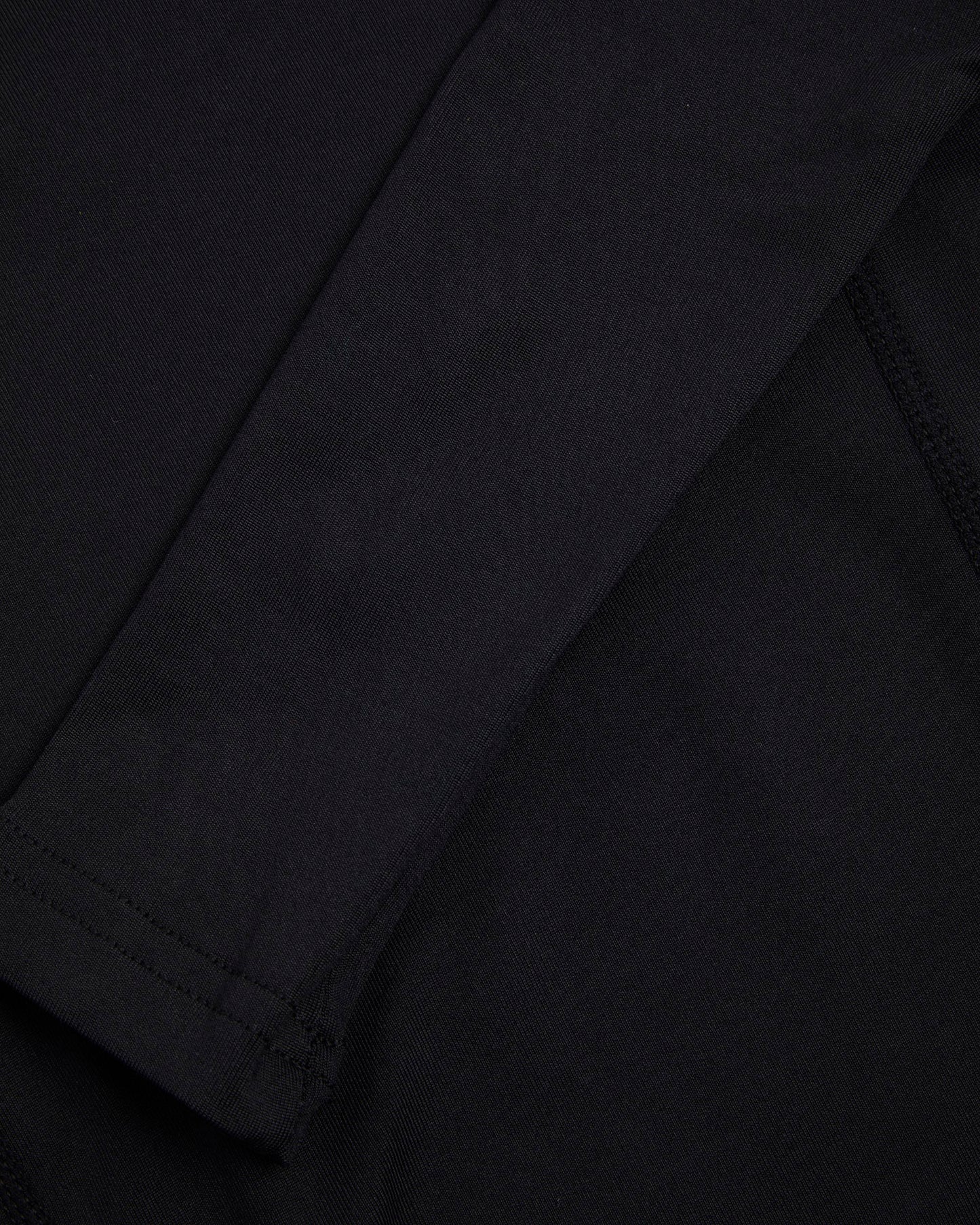 Close up of long sleeve fabric of black baselayer