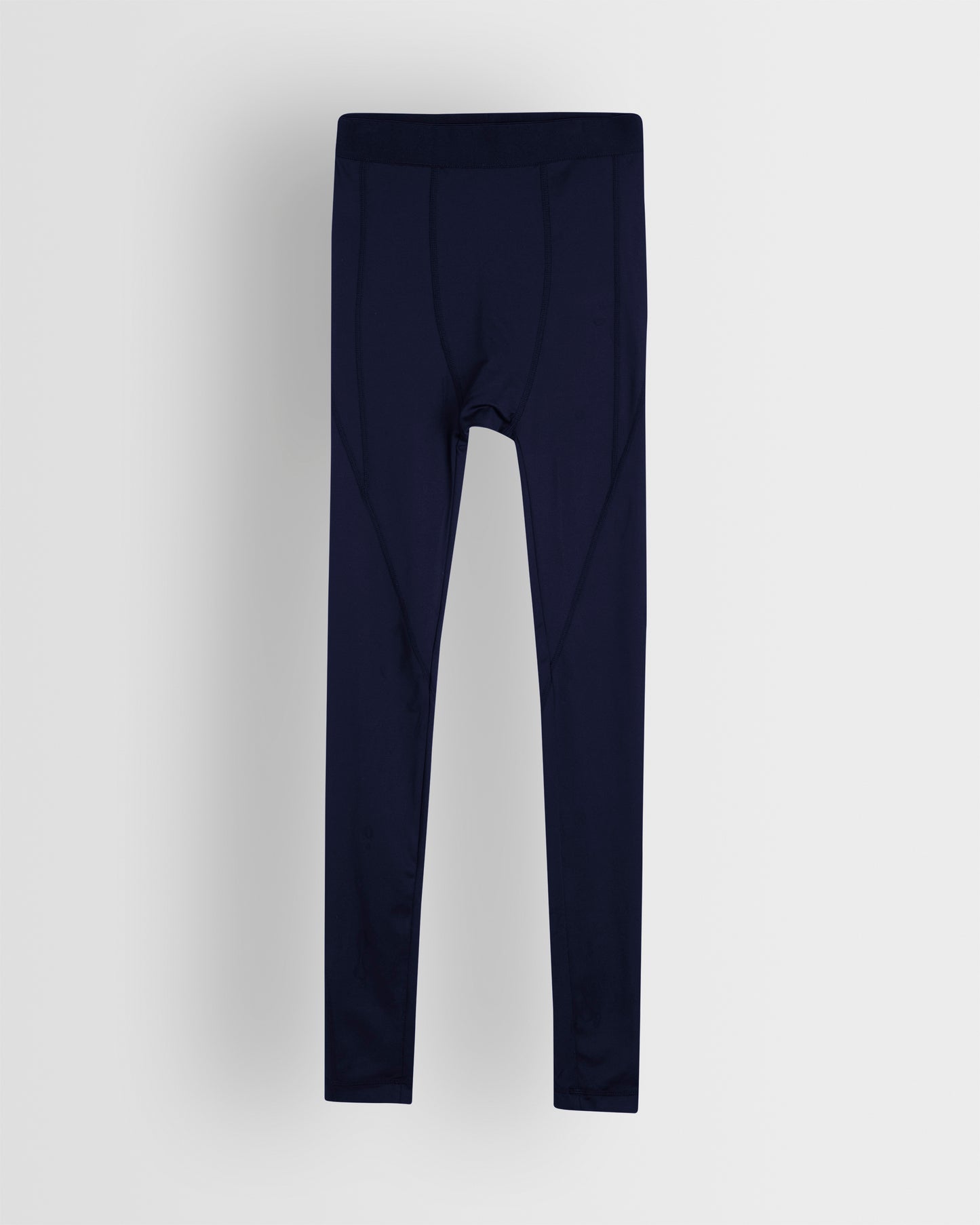 A pair of navy blue unisex base leggings for youth and adults