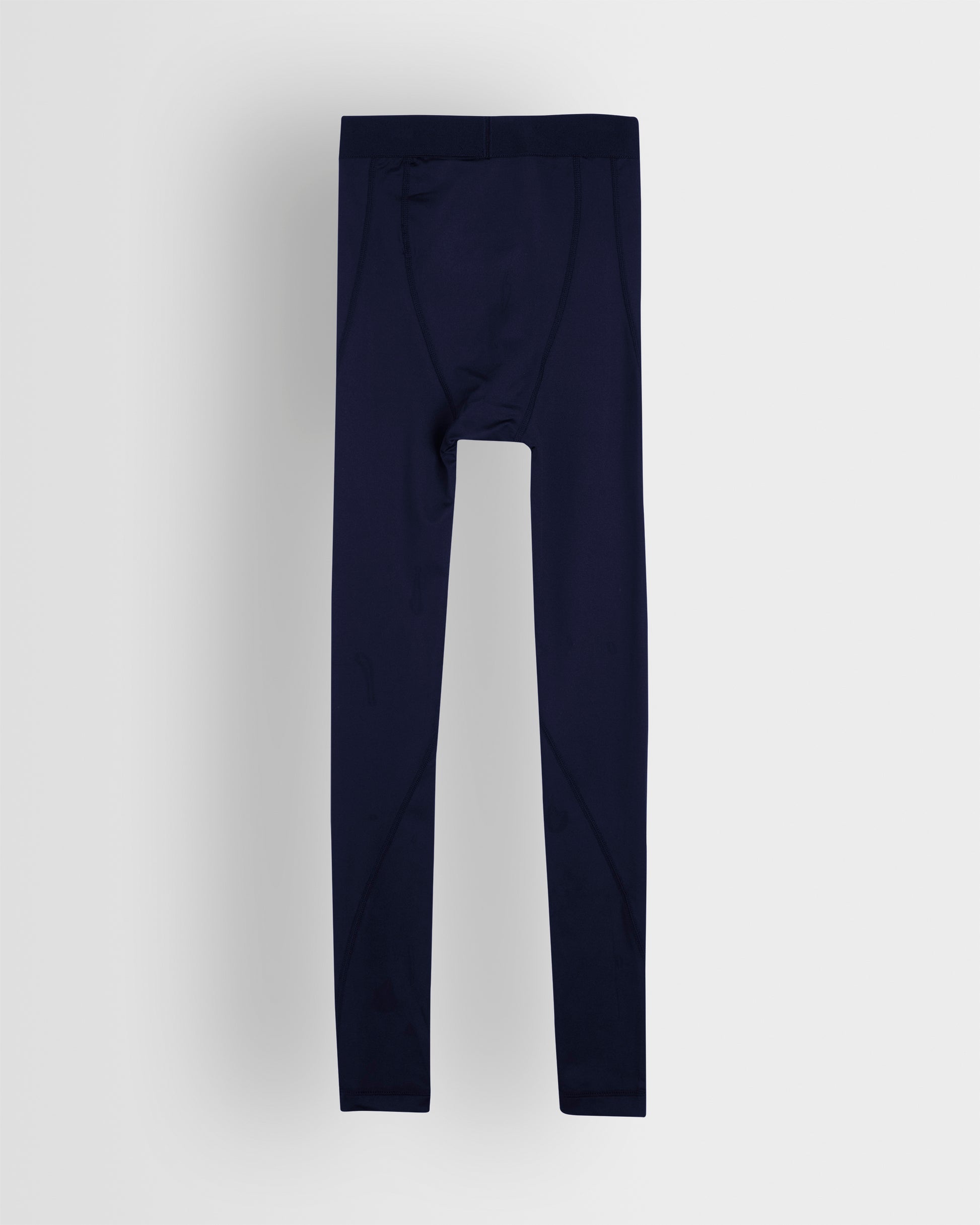 Back shot of a pair of navy blue unisex base leggings for youth and adults