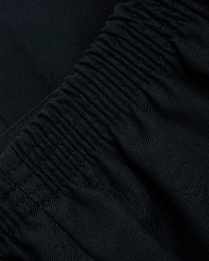 Close up of waitsband eclastic of boys navy summer shorts