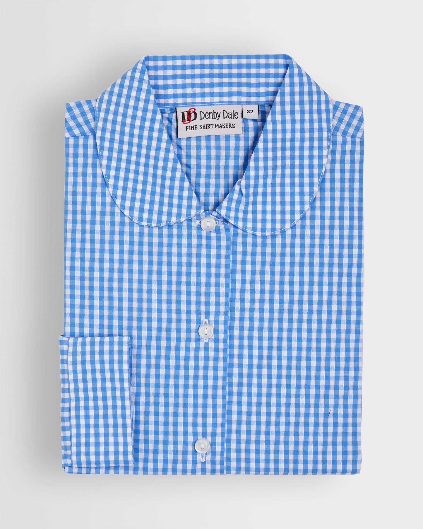 Folded shot of a long sleeved blue and white gingham blouse with a peter pan collar and button-up front.