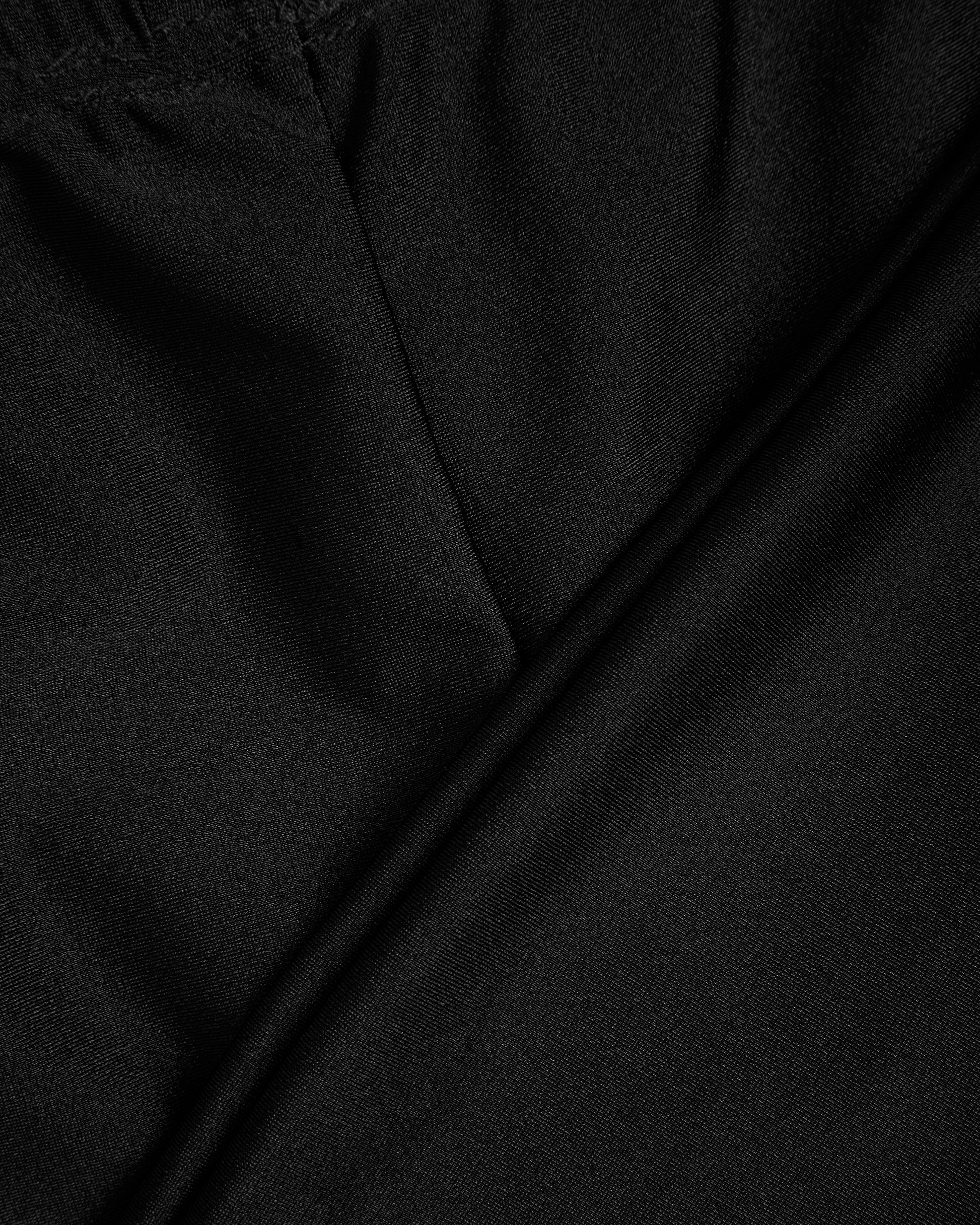 Close up of black swimming jammers fabric