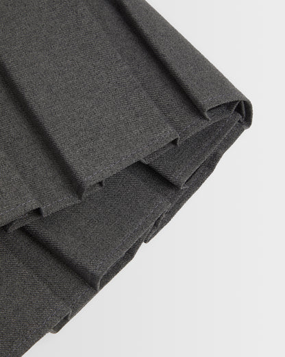 A closeup of the box pleat displayed against a plain background.